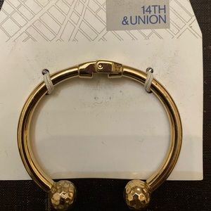 14th & Union hinged gold costume bracelet.